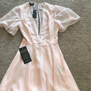 Bebe pink flutter dress low cut